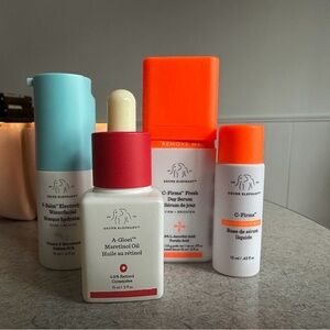 Drunk Elephant Skincare Collection with Blue, Orange, and White
